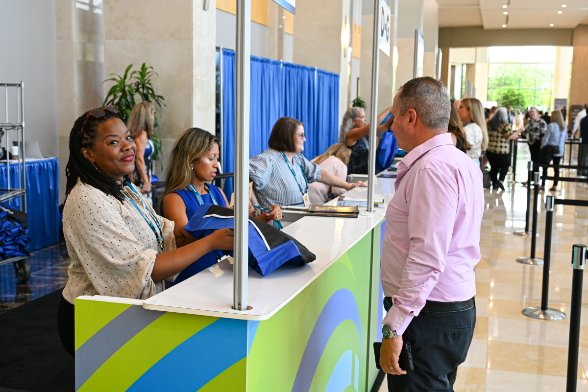 Attendees arriving at WCI 2026